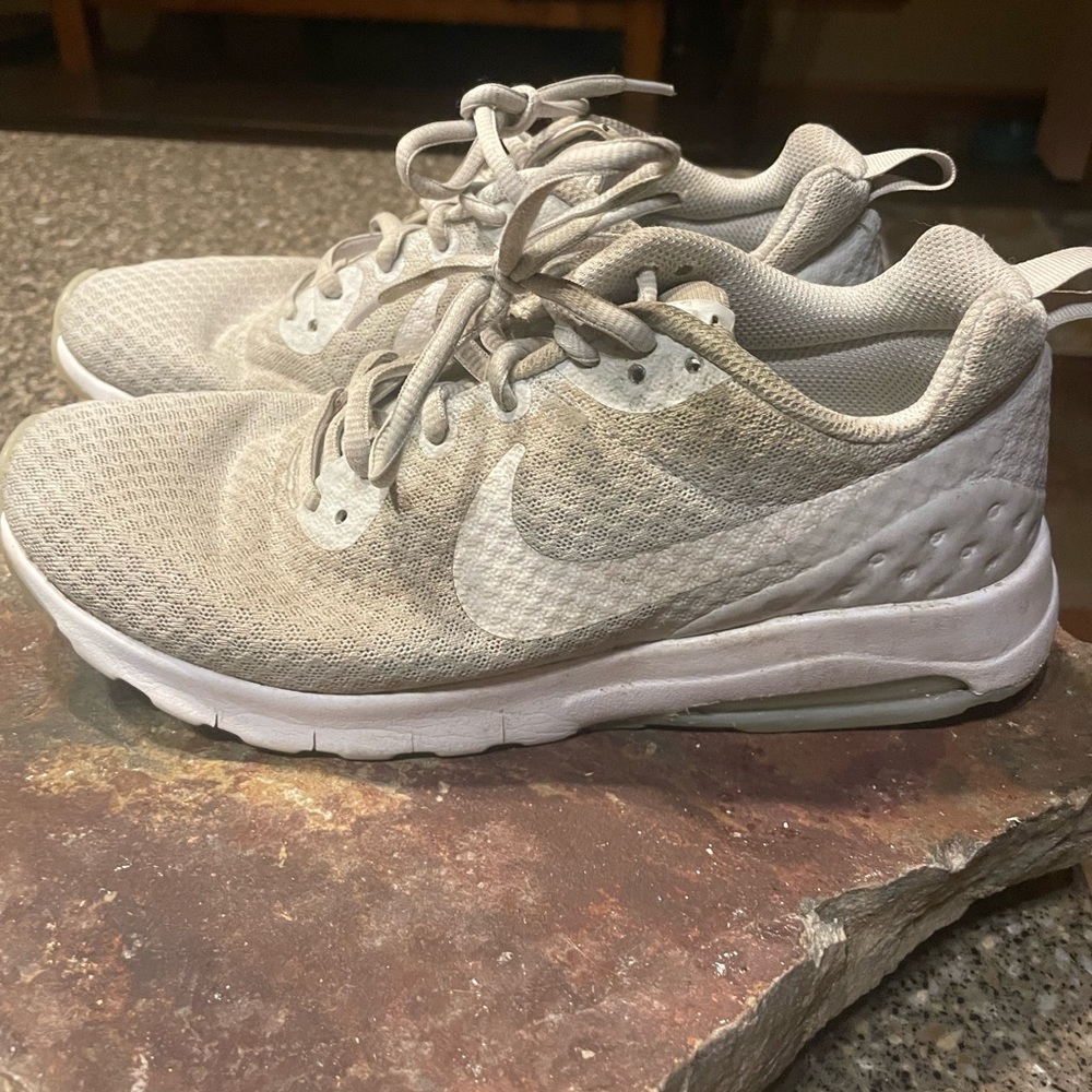 Nike women’s running or casual shoe. Gray and white. Size 8.
